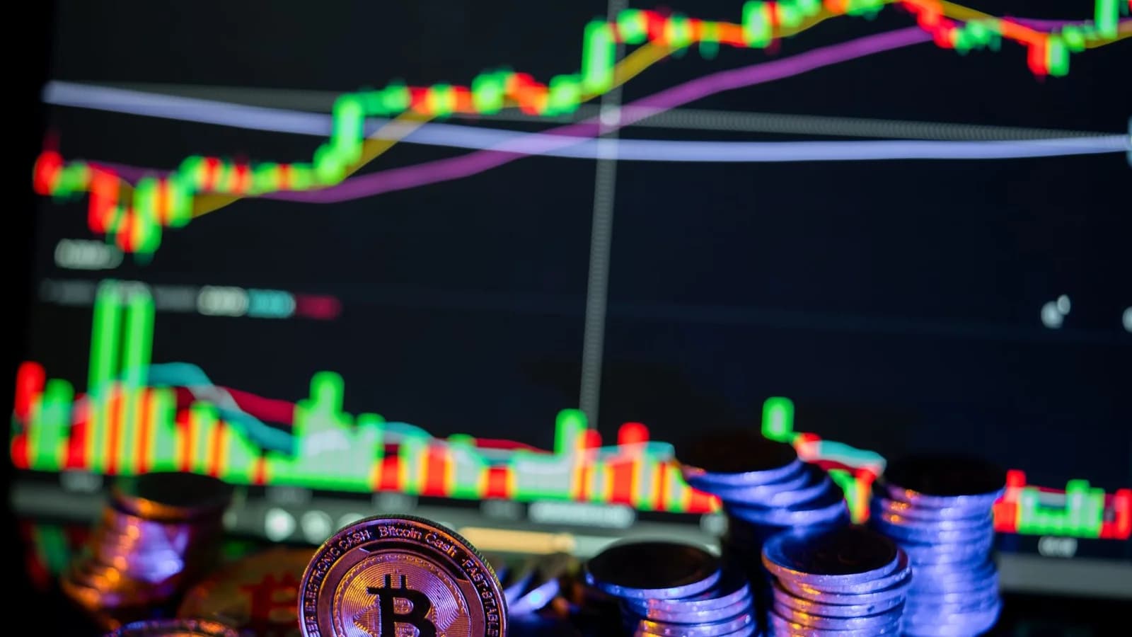 Bitcoin coins and market data illustrating how transaction outputs move through the network